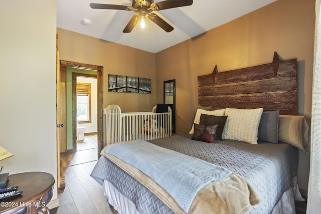 bedroom with ceiling fan and light hardwood / wood-style flooring