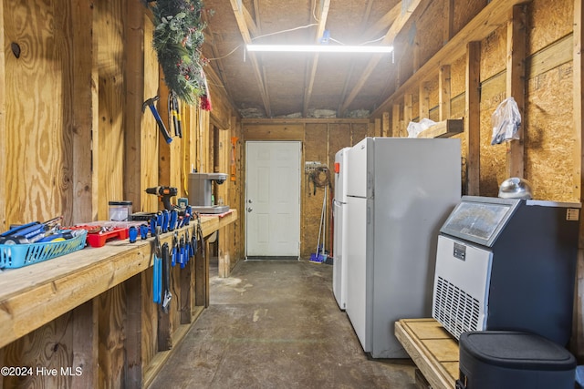 interior space with white refrigerator