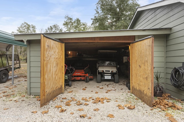 exterior space with a carport