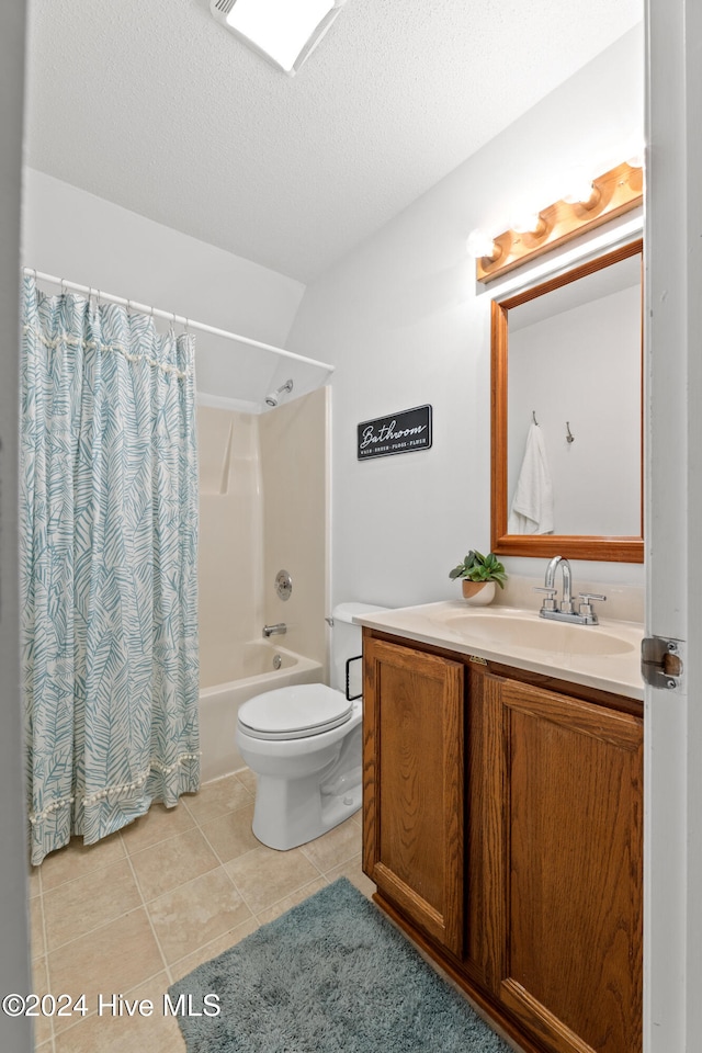 full bathroom featuring tile patterned floors, toilet, a textured ceiling, vanity, and shower / bathtub combination with curtain