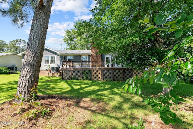 212 Outrigger Rd, New Bern, NC 28562 - view of grassy yard featuring a deck