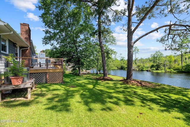 212 Outrigger Rd, New Bern, NC 28562 - view of grassy yard with a deck with water view
