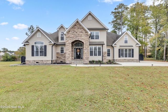 view of front of home featuring a front yard