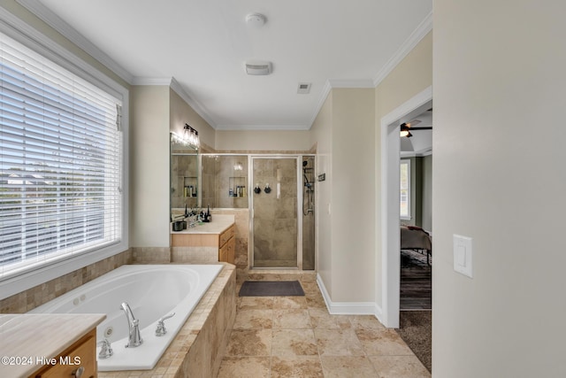 bathroom with a wealth of natural light, vanity, independent shower and bath, and ornamental molding