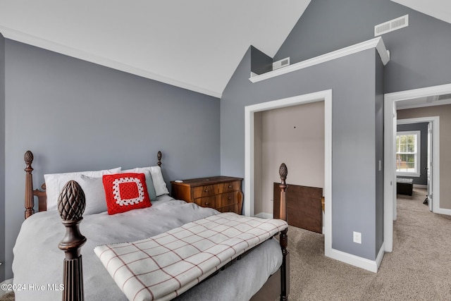 bedroom featuring high vaulted ceiling, crown molding, and carpet floors