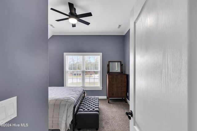 carpeted bedroom featuring lofted ceiling and ceiling fan