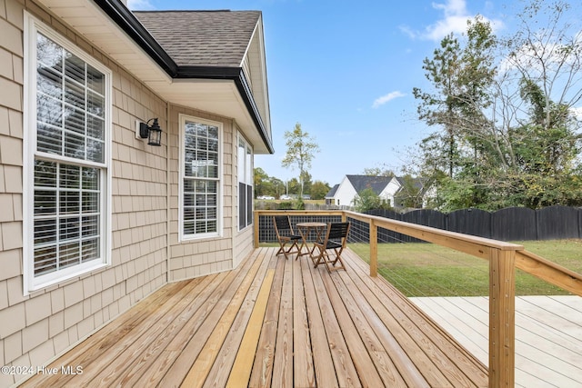 deck featuring a yard