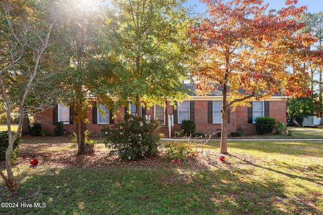 view of front of home with a front yard