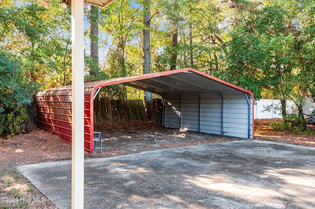 view of parking / parking lot with a carport