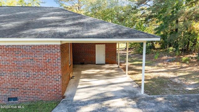 view of patio / terrace with a carport