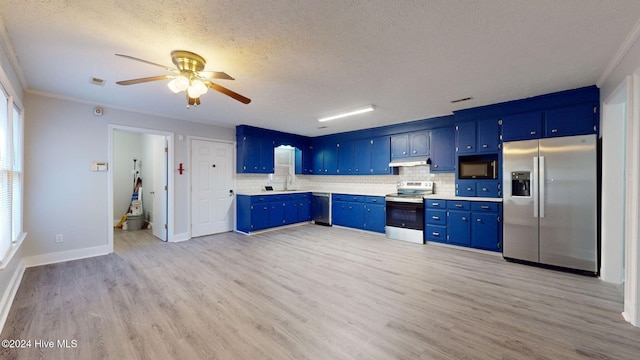 kitchen with blue cabinetry, decorative backsplash, stainless steel appliances, and light hardwood / wood-style flooring