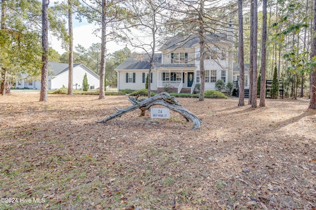 74 Driftwood Ct, Arapahoe, NC 28510 - colonial-style house with a porch