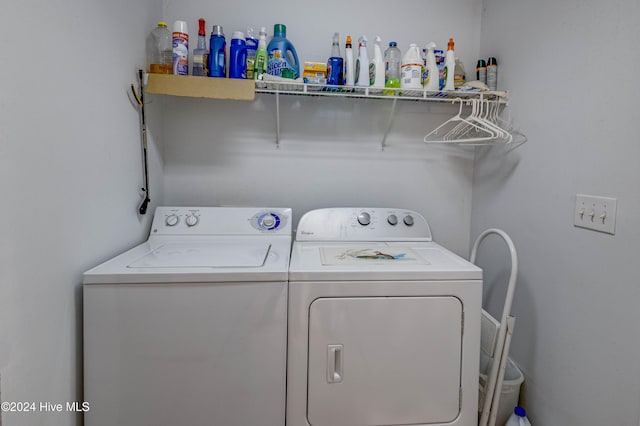 clothes washing area featuring washing machine and dryer