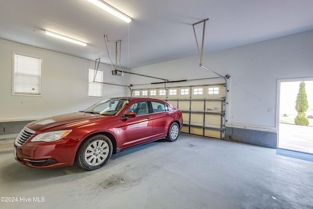 74 Driftwood Ct, Arapahoe, NC 28510 - garage featuring a garage door opener