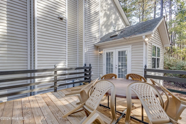 74 Driftwood Ct, Arapahoe, NC 28510 - wooden deck featuring french doors and outdoor dining area