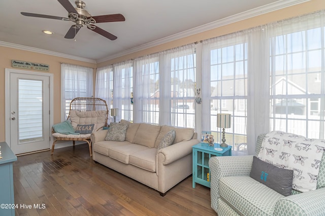 sunroom featuring ceiling fan