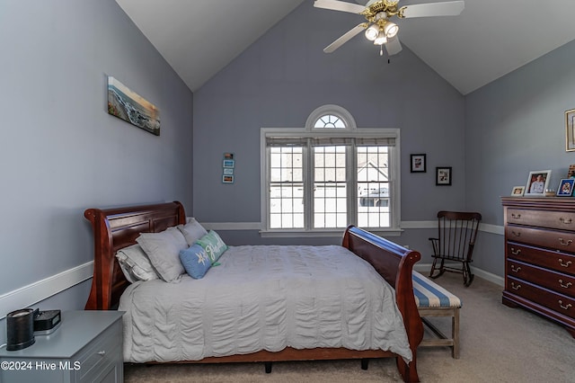 bedroom with ceiling fan, light carpet, and lofted ceiling