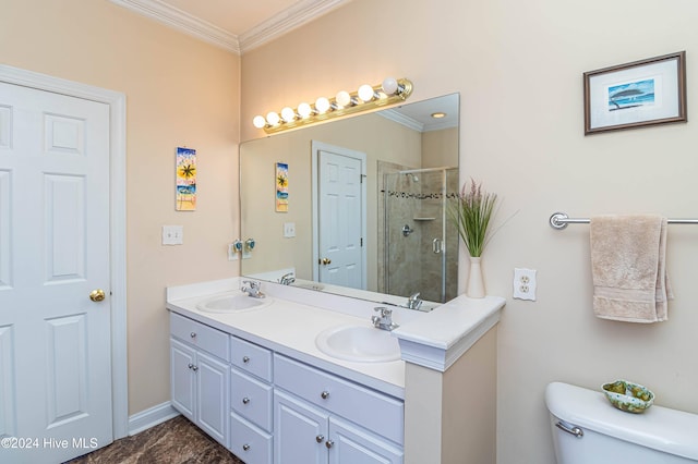 bathroom with vanity, toilet, a shower with shower door, and crown molding