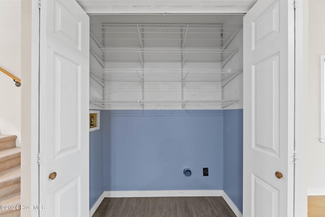 clothes washing area with hookup for an electric dryer, dark hardwood / wood-style flooring, and hookup for a washing machine