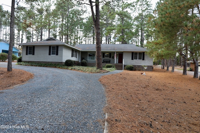 ranch-style house with a porch