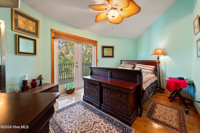 bedroom with access to exterior, ceiling fan, and light hardwood / wood-style floors