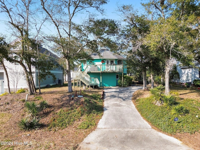 raised beach house with a deck