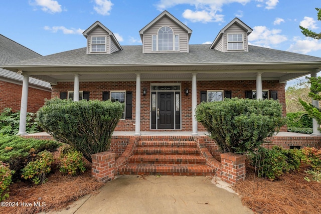 view of front of home featuring covered porch