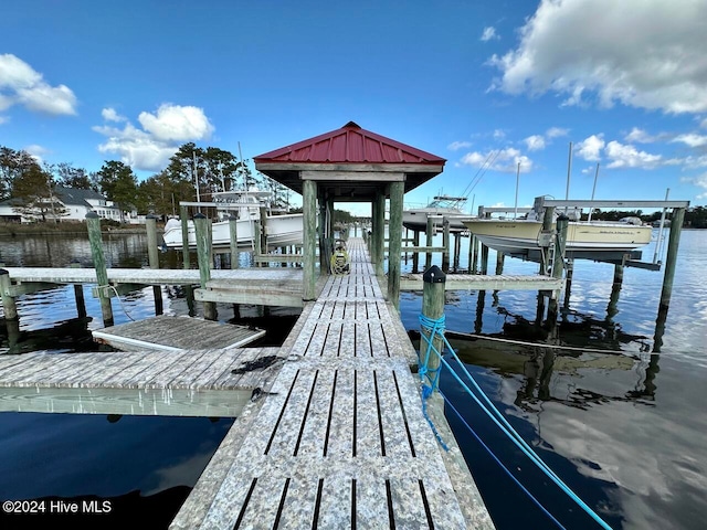 view of dock with a water view