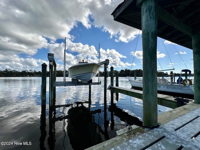 view of dock with a water view