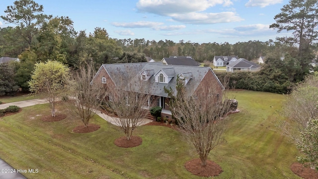 exterior space with a front lawn