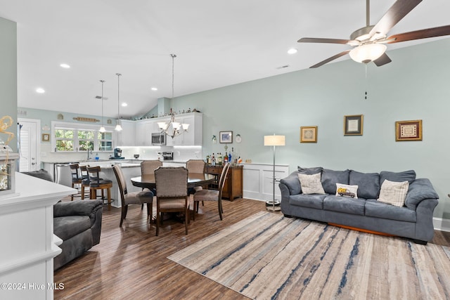 1296 Marsilio Ln SW Unit A, Ocean Isle Beach, NC 28469 - living room featuring lofted ceiling, a chandelier, wood finished floors, a ceiling fan, and recessed lighting