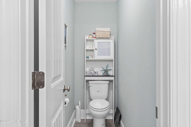 bathroom with tile patterned floors and toilet