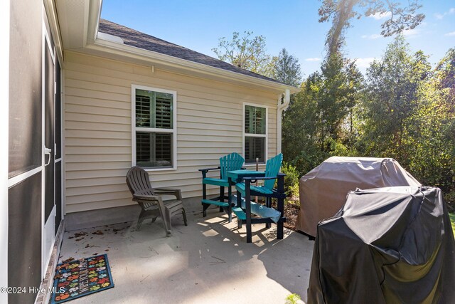 1296 Marsilio Ln SW Unit A, Ocean Isle Beach, NC 28469 - view of patio featuring area for grilling