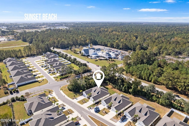 1296 Marsilio Ln SW Unit A, Ocean Isle Beach, NC 28469 - view of property location with a heavily wooded area and nearby suburban area