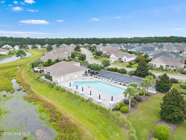 1296 Marsilio Ln SW Unit A, Ocean Isle Beach, NC 28469 - aerial view of residential area featuring a nearby body of water and a pool area