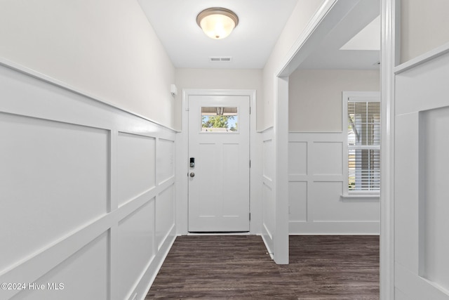 entryway with dark wood-type flooring