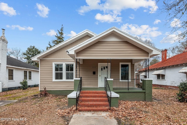 bungalow-style home with a porch