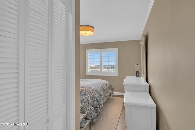 bedroom with crown molding