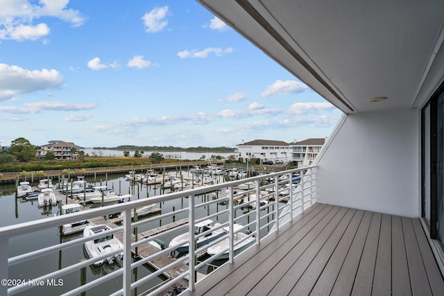 balcony featuring a water view