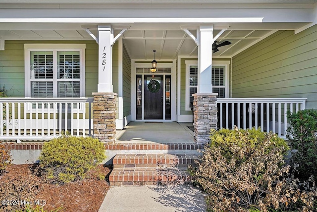 entrance to property featuring a porch