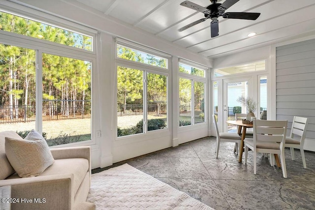 sunroom / solarium with ceiling fan