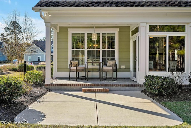 property entrance featuring a porch