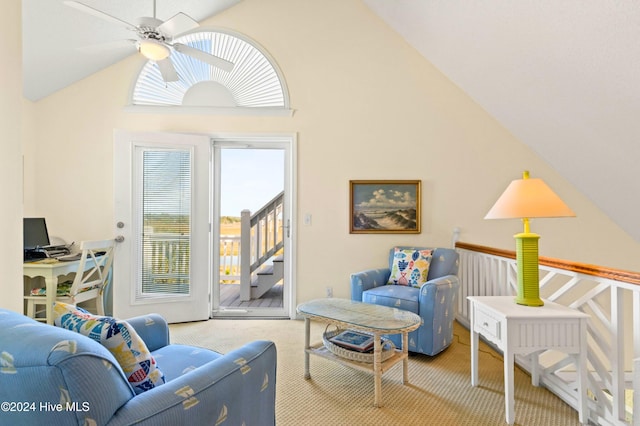 living area with vaulted ceiling and carpet flooring