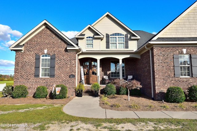 view of front of home featuring covered porch