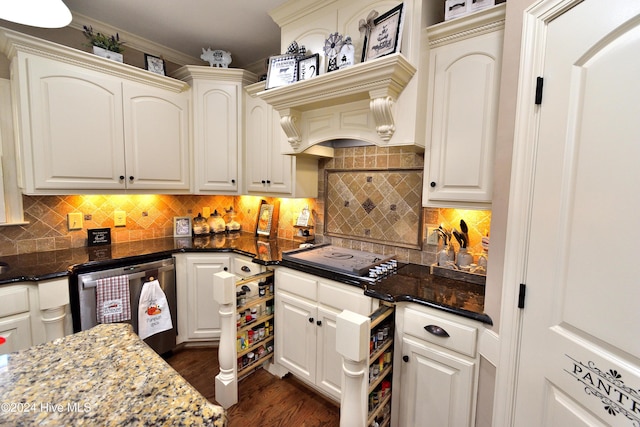 kitchen featuring dark hardwood / wood-style floors, white cabinetry, dishwasher, dark stone counters, and black cooktop