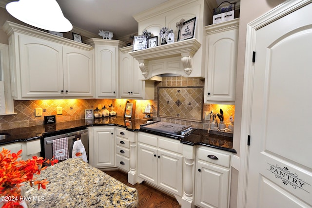 kitchen with dishwasher, black electric stovetop, white cabinets, and decorative backsplash