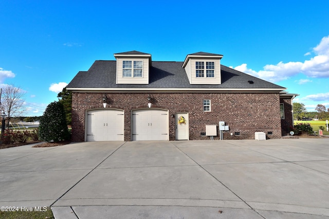 view of home's exterior with a garage