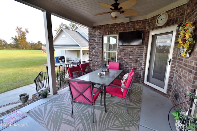 view of patio featuring ceiling fan