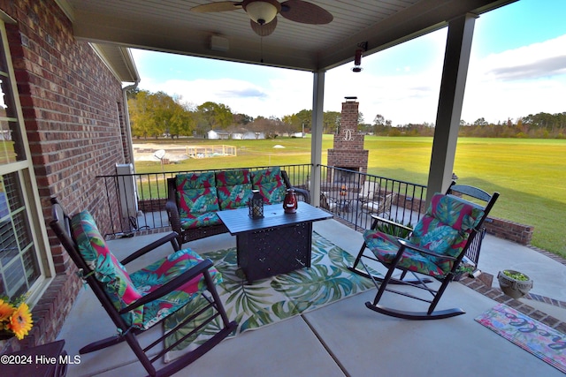 view of patio featuring ceiling fan