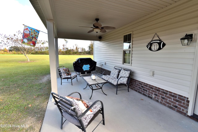 view of patio with ceiling fan and an outdoor hangout area